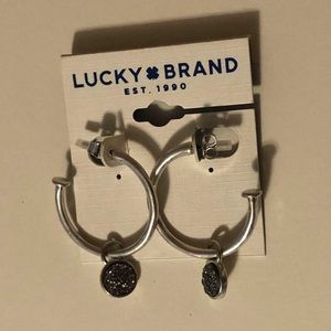 NWT Lucky matte silver loops with jeweled round disks